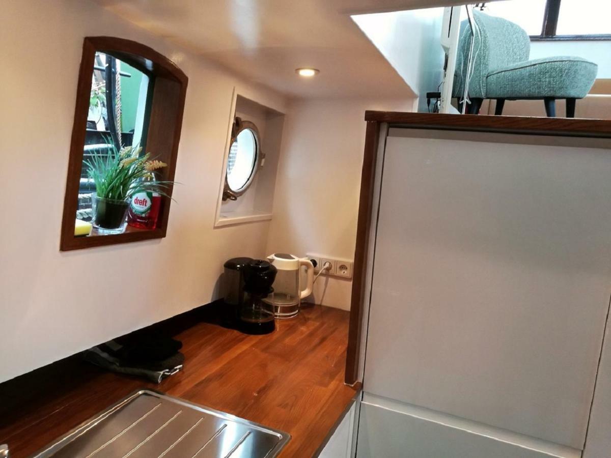 Houseboat Rose Apartment อัมสเตอร์ดัม ภายนอก รูปภาพ